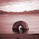 This Monday, May 18, 2015 photo shows a partially submerged tire as it sits along the shore of Lake Mead in the Lake Mead National Recreation Area near Boulder City, Nev. Wet weather in May and June prompted optimistic projections Monday from federal water managers keeping close tabs on the Colorado River water supply for about 40 million residents in seven Southwest U.S. states.